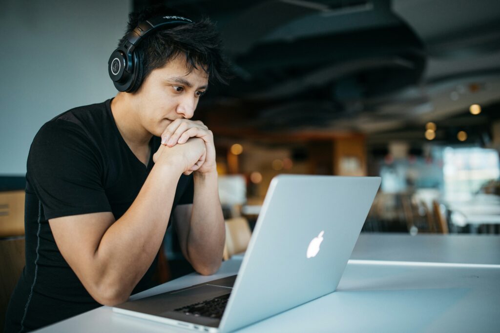 student sitting in front of a computer